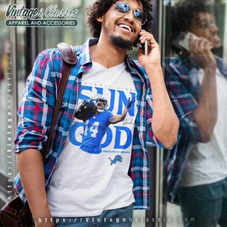 Amon Ra St Brown Sun God Shirt Detroit Lionsfootball Player Signature V Neck TShirt Amon Ra St Brown Sun God Shirt Detroit Lionsfootball Player Signature V Neck TShirt