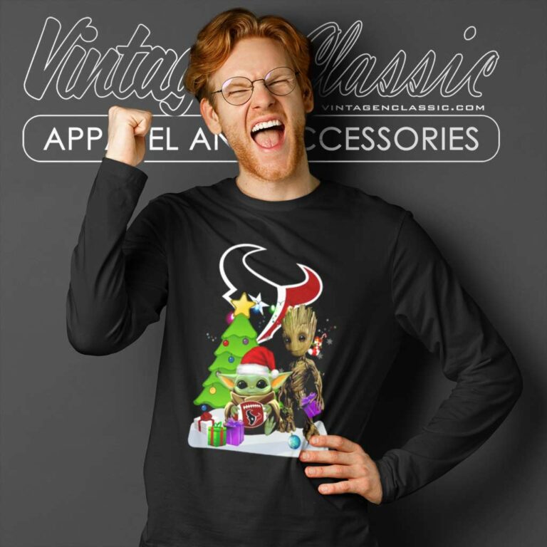 Baby Yoda Hug And Santa Bigfoot Houston Texans Snow Christmas Tree Long Sleeve Tee Baby Yoda Hug And Santa Bigfoot Houston Texans Snow Christmas Tree Long Sleeve Tee