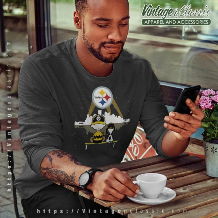 Charlie Brown And Snoopy Dog Watching City Pittsburgh Steelers Sweatshirt Charlie Brown And Snoopy Dog Watching City Pittsburgh Steelers Sweatshirt