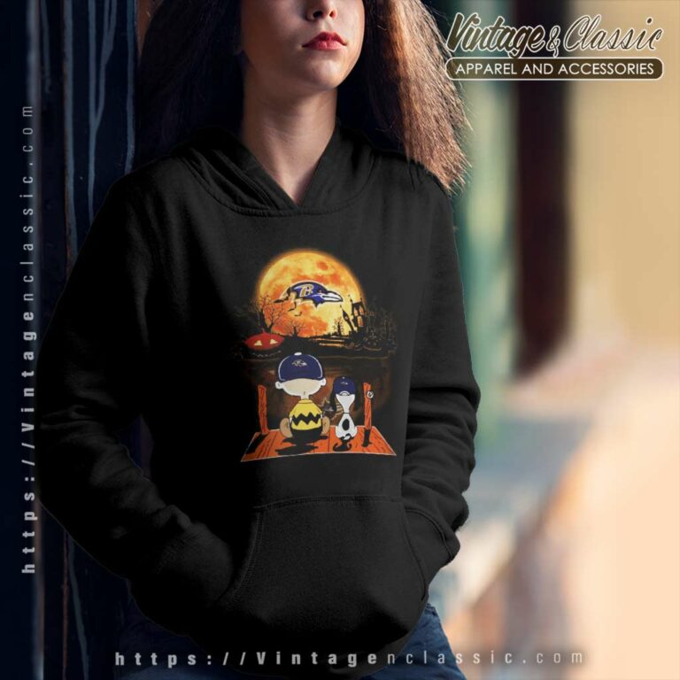 Charlie Brown And Snoopy Watching Baltimore Ravens Halloween Hoodie Charlie Brown And Snoopy Watching Baltimore Ravens Halloween Hoodie