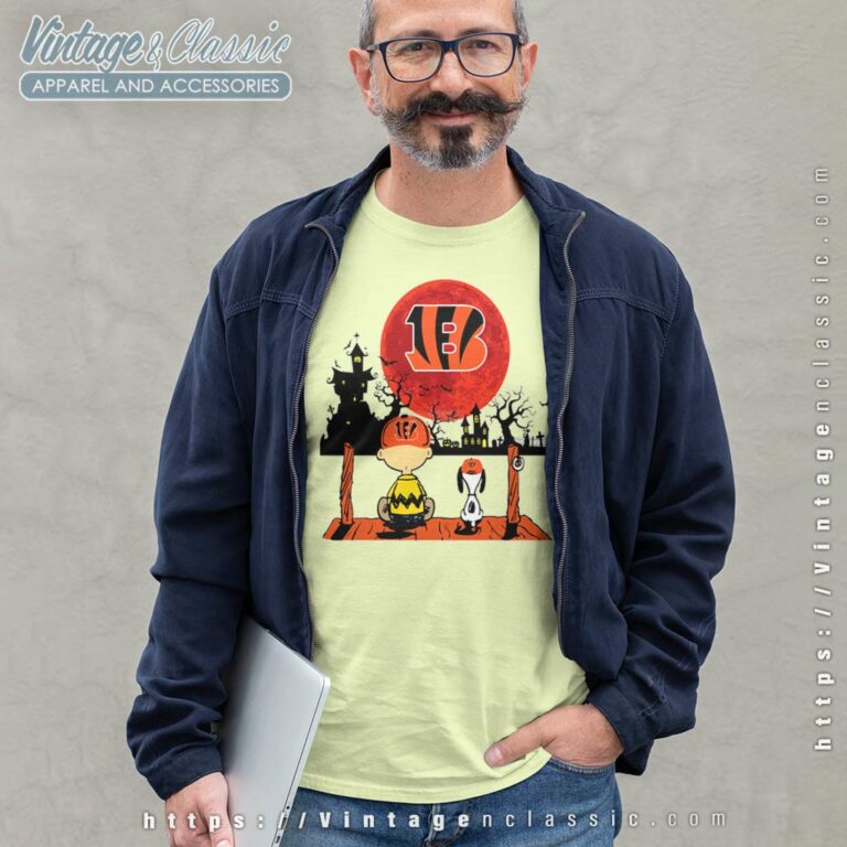 Charlie Brown And Snoopy Watching Cincinnati Bengals Halloween Long Sleeve Tee Charlie Brown And Snoopy Watching Cincinnati Bengals Halloween Long Sleeve Tee