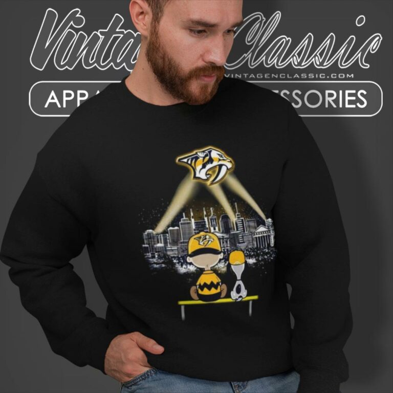 Charlie Brown And Snoopy Watching City Nashville Predators Sweatshirt Charlie Brown And Snoopy Watching City Nashville Predators Sweatshirt