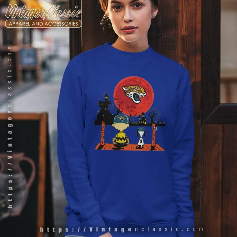 Charlie Brown And Snoopy Watching Jacksonville Jaguars Charl Sweatshirt Charlie Brown And Snoopy Watching Jacksonville Jaguars Charl Sweatshirt
