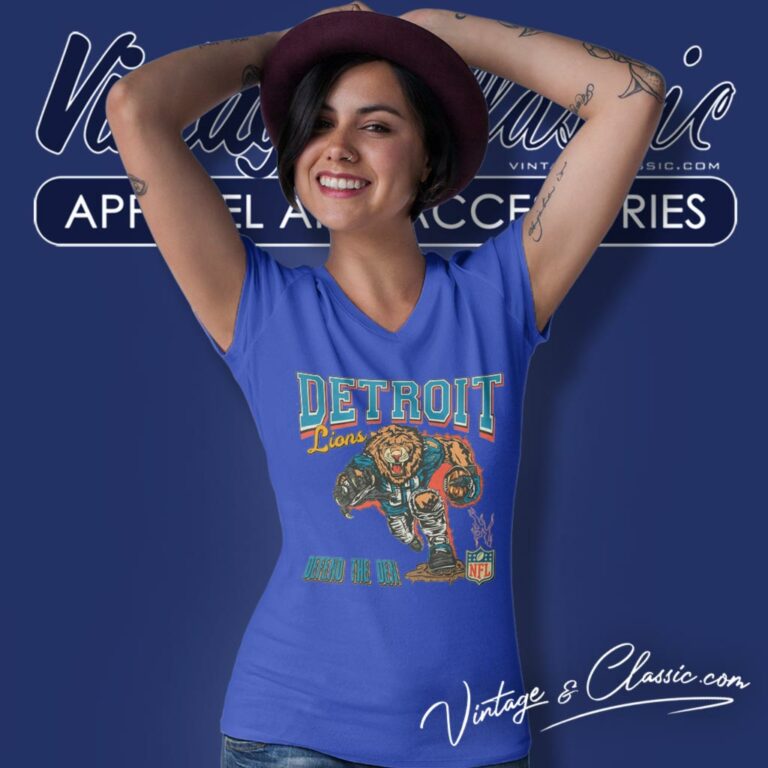 Detroit Lions Mascot Defend The Den V Neck TShirt Detroit Lions Mascot Defend The Den V Neck TShirt