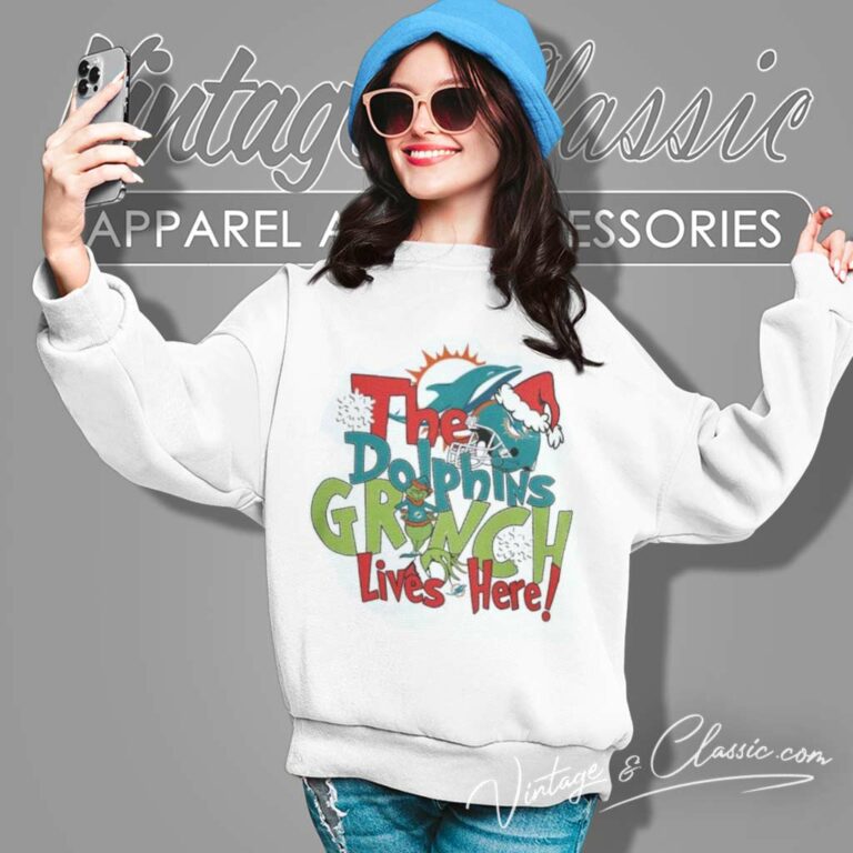 Dolphins X Grinch Lives Here Christmas Sweatshirt Dolphins X Grinch Lives Here Christmas Sweatshirt