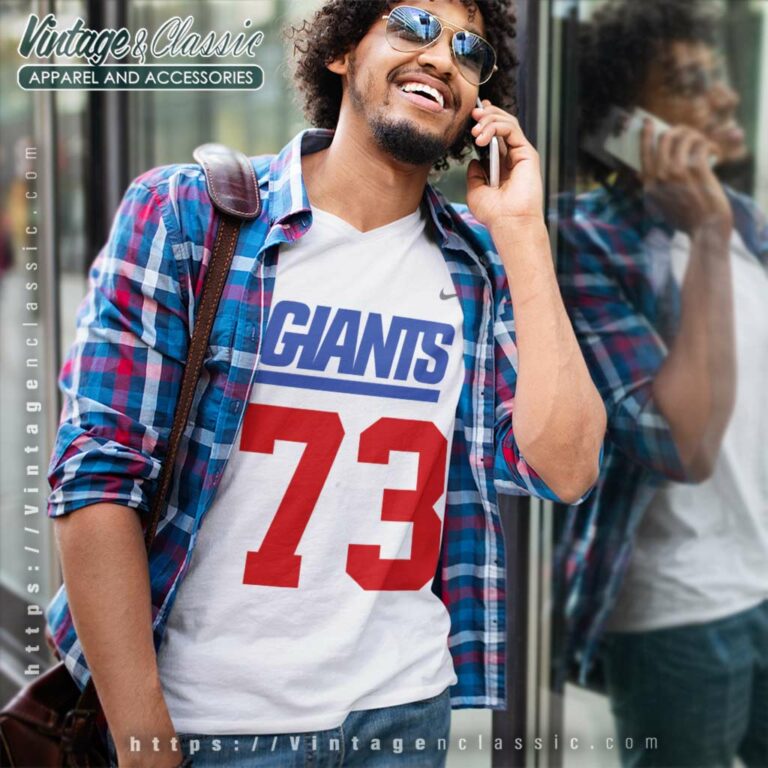 Evan Neal New York Giants 73 Nike Logo V Neck TShirt Evan Neal New York Giants 73 Nike Logo V Neck TShirt