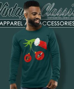 Grinch Hand Holding Orioles And Ravens Shirt 2 Grinch Hand Holding Orioles And Ravens Long Sleeve Tee