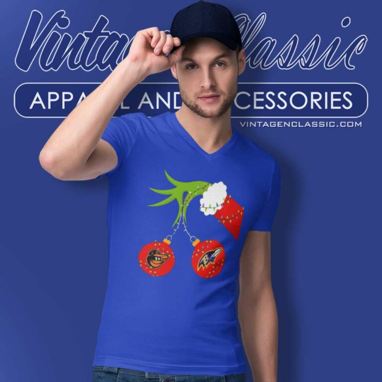 Grinch Hand Holding Orioles And Ravens V Neck TShirt Grinch Hand Holding Orioles And Ravens V Neck TShirt