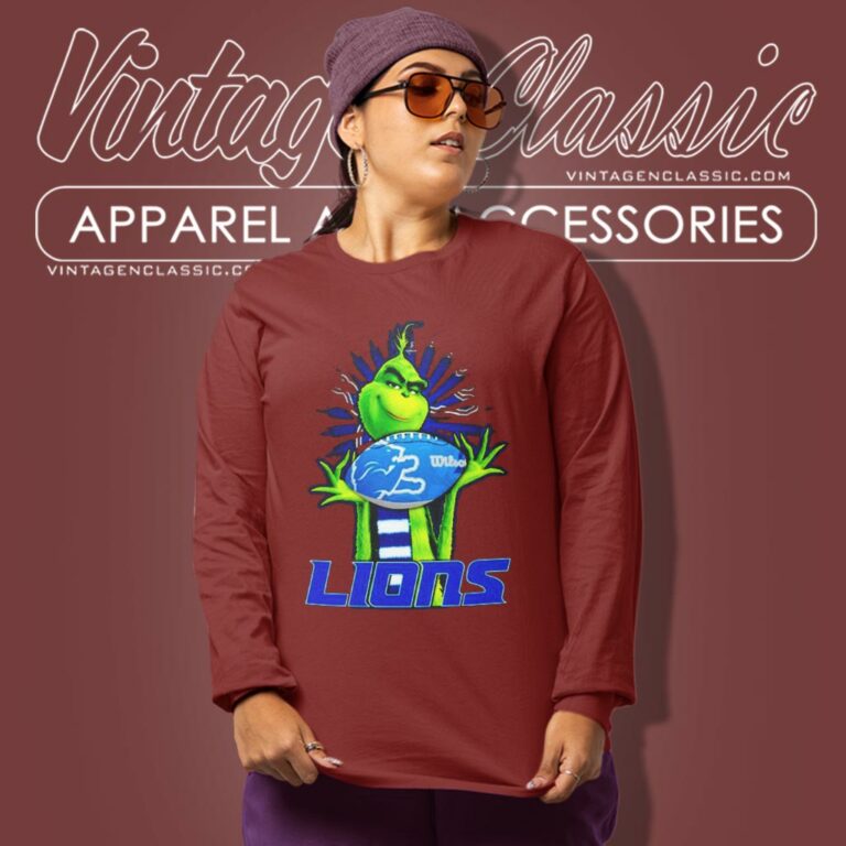 Grinch Hat Santa Hug Rugby Ball Detroit Lions Long Sleeve Tee Grinch Hat Santa Hug Rugby Ball Detroit Lions Long Sleeve Tee