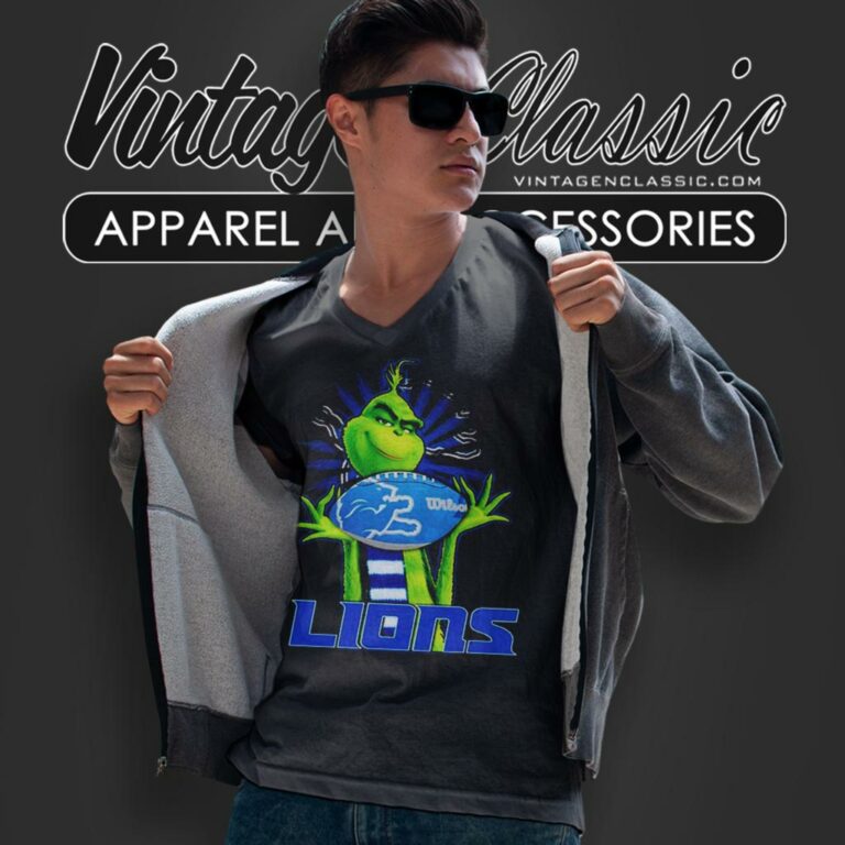 Grinch Hat Santa Hug Rugby Ball Detroit Lions V Neck TShirt Grinch Hat Santa Hug Rugby Ball Detroit Lions V Neck TShirt