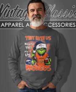 Grinch They Hate Us Because They Aint Us Denver Broncos Christmas Shirt Long Sleeve Tee