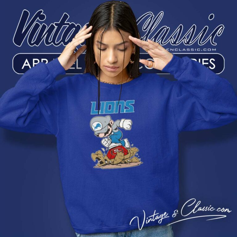 Mario Lions Stomps On San Francisco 49ers Sweatshirt Mario Lions Stomps On San Francisco 49ers Sweatshirt