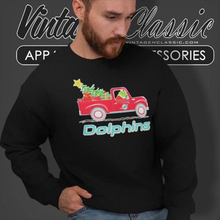 Miami Dolphins Santa Grinch Driving Truck Christmas Sweatshirt Miami Dolphins Santa Grinch Driving Truck Christmas Sweatshirt