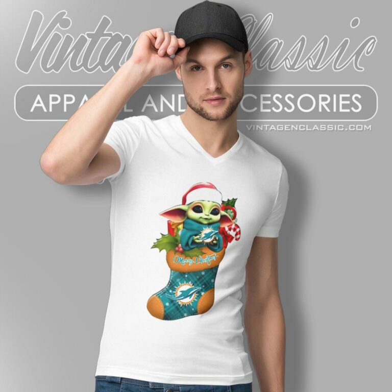 Miami Dolphins Shirt Baby Yoda Hug Ornament Merry Christmas V Neck TShirt Miami Dolphins Shirt Baby Yoda Hug Ornament Merry Christmas V Neck TShirt
