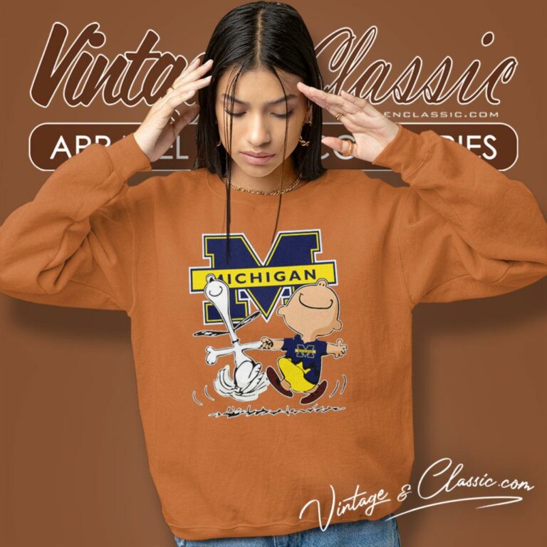Michigan Wolverines Charlie Brown Snoopy Dancing Sweatshirt Michigan Wolverines Charlie Brown Snoopy Dancing Sweatshirt