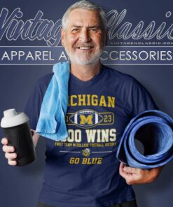 Michigan Wolverines Go Blue 1000 Wins Shirt First Team In College Football History V Neck TShirt