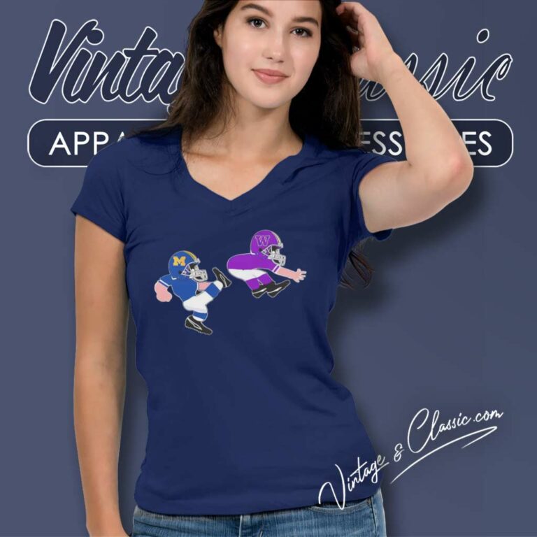 Michigan Wolverines Kicks Washington Huskies V Neck TShirt 1 Michigan Wolverines Kicks Washington Huskies V Neck TShirt 1