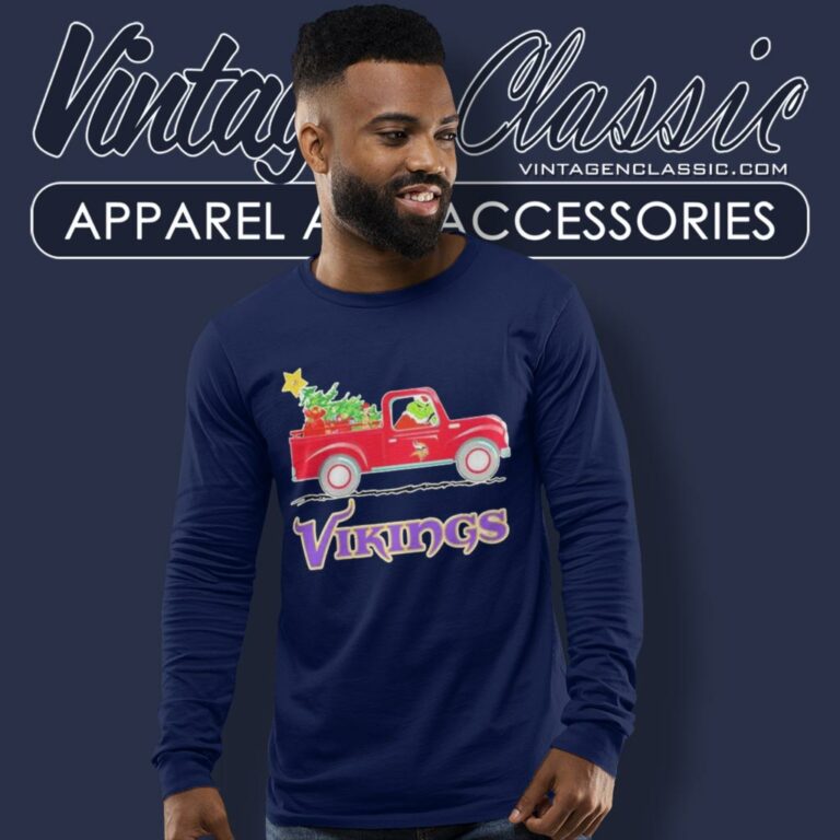 Minnesota Vikings Santa Grinch Driving Truck Christmas Long Sleeve Tee Minnesota Vikings Santa Grinch Driving Truck Christmas Long Sleeve Tee