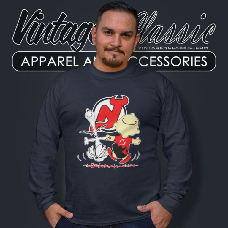 New Jersey Devils Snoopy And Charlie Brown Dancing Long Sleeve Tee New Jersey Devils Snoopy And Charlie Brown Dancing Long Sleeve Tee