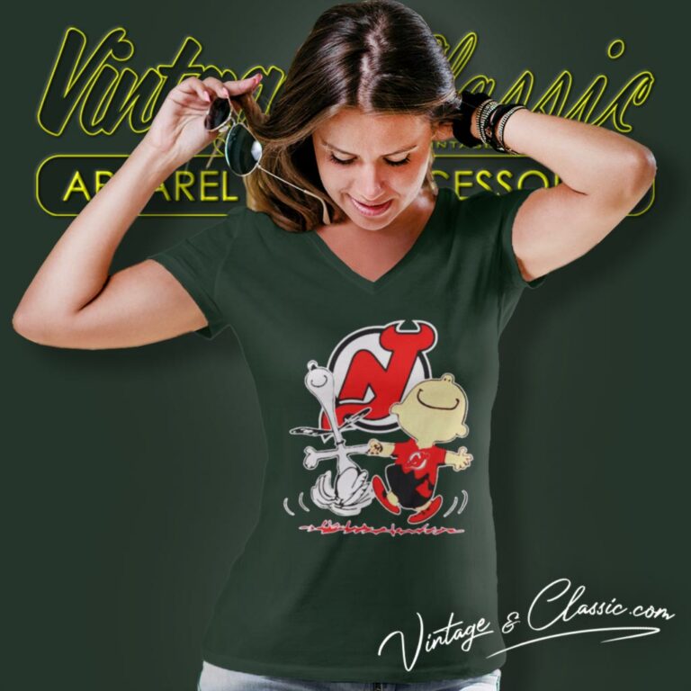 New Jersey Devils Snoopy And Charlie Brown Dancing V Neck TShirt New Jersey Devils Snoopy And Charlie Brown Dancing V Neck TShirt