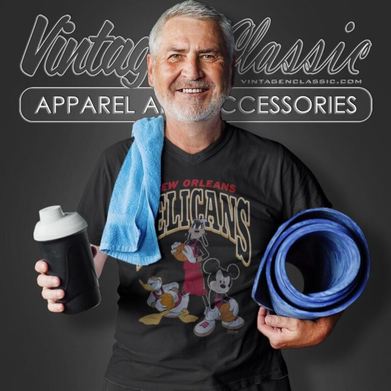 New Orleans Pelicans Shirt Junk Food Navy Disney Mickey Squad V Neck TShirt New Orleans Pelicans Shirt Junk Food Navy Disney Mickey Squad V Neck TShirt