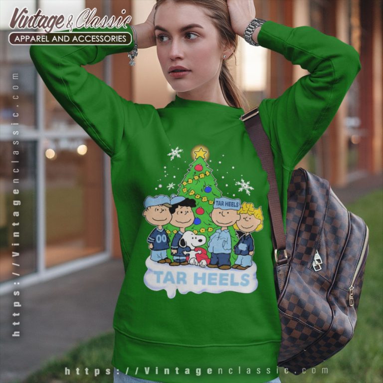 Peanuts Characters Loves Christmas And North Carolina Tar Heels Sweatshirt Peanuts Characters Loves Christmas And North Carolina Tar Heels Sweatshirt
