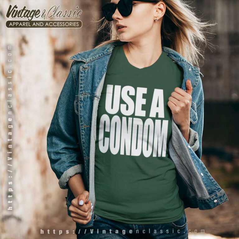 Rihanna Wears Use A Condom V Neck TShirt Rihanna Wears Use A Condom V Neck TShirt