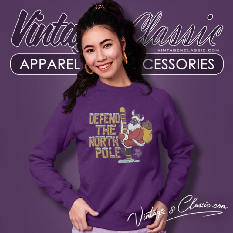 Santa Claus Minnesota Vikings Defend The North Pole Christmas Sweatshirt Santa Claus Minnesota Vikings Defend The North Pole Christmas Sweatshirt