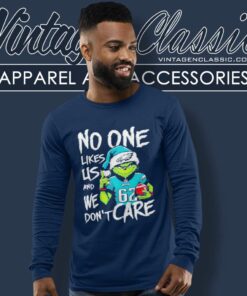 Santa Grinch Philadelphia Eagles Shirt No One Likes Us And We Dont Care Long Sleeve Tee