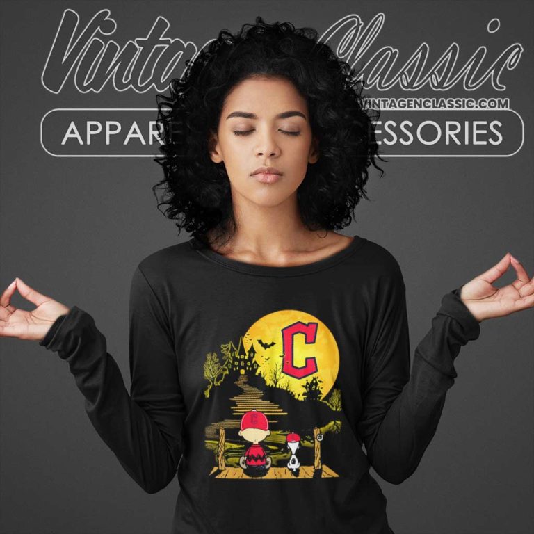 Snoopy And Charlie Brown Sit Under Moon Cleveland Guardians Halloween Long Sleeve Tee Snoopy And Charlie Brown Sit Under Moon Cleveland Guardians Halloween Long Sleeve Tee
