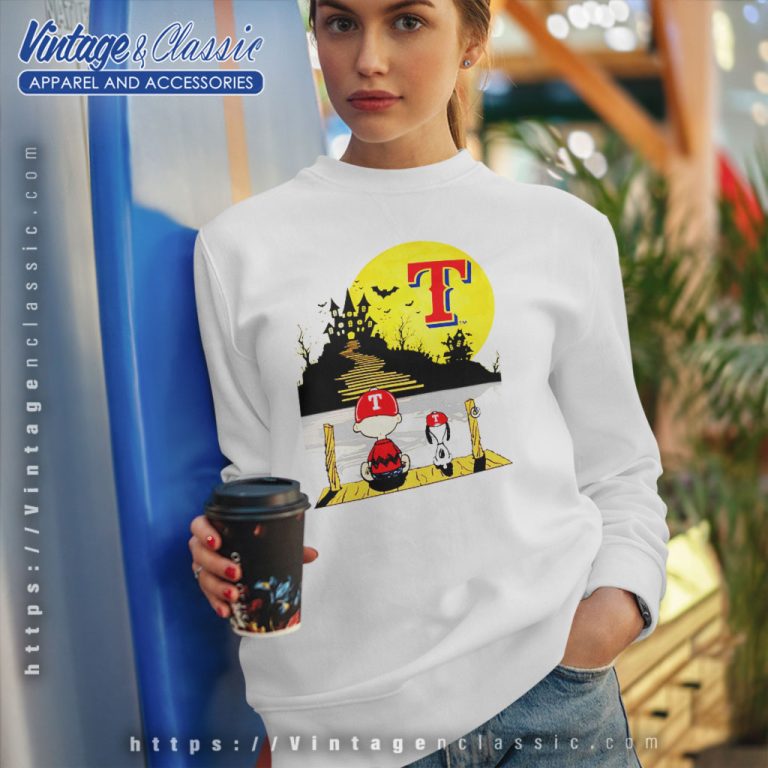 Snoopy And Charlie Brown Sit Under Moon Texas Rangers Halloween Sweatshirt Snoopy And Charlie Brown Sit Under Moon Texas Rangers Halloween Sweatshirt