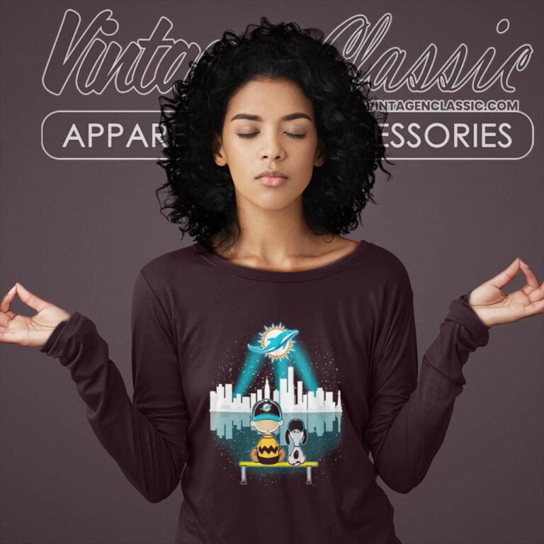 Snoopy And Charlie Brown Watching City Miami Dolphins Long Sleeve Tee Snoopy And Charlie Brown Watching City Miami Dolphins Long Sleeve Tee