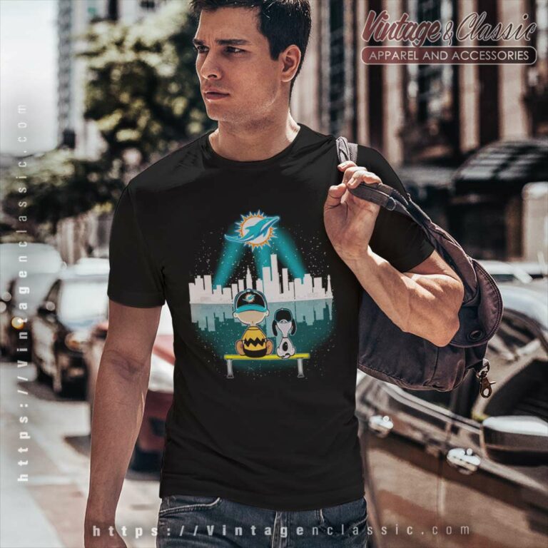 Snoopy And Charlie Brown Watching City Miami Dolphins T Shirt Snoopy And Charlie Brown Watching City Miami Dolphins T Shirt