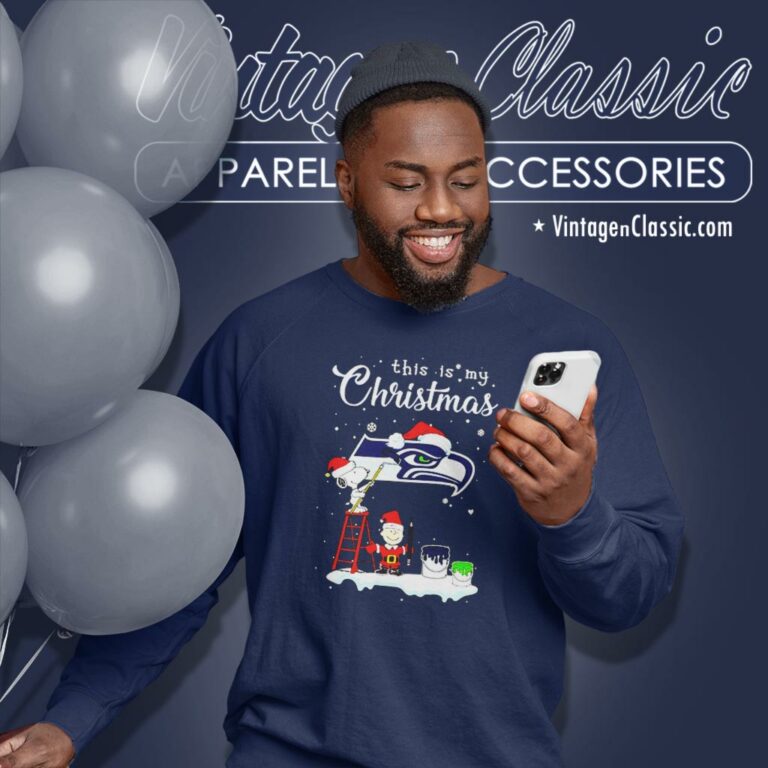 Snoopy Charlie Brown Santa Seattle Seahawks Christmas Sweatshirt Snoopy Charlie Brown Santa Seattle Seahawks Christmas Sweatshirt