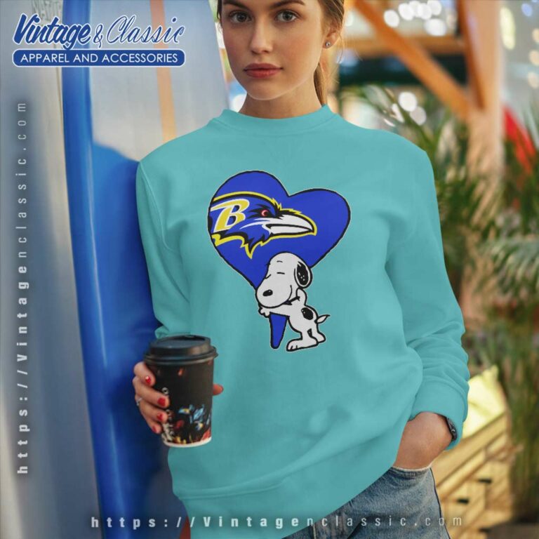 Snoopy Hugs The Baltimore Ravens Heart Sweatshirt Snoopy Hugs The Baltimore Ravens Heart Sweatshirt