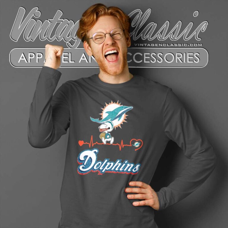 Snoopy Miami Dolphins Logo Heartbeat Long Sleeve Tee Snoopy Miami Dolphins Logo Heartbeat Long Sleeve Tee