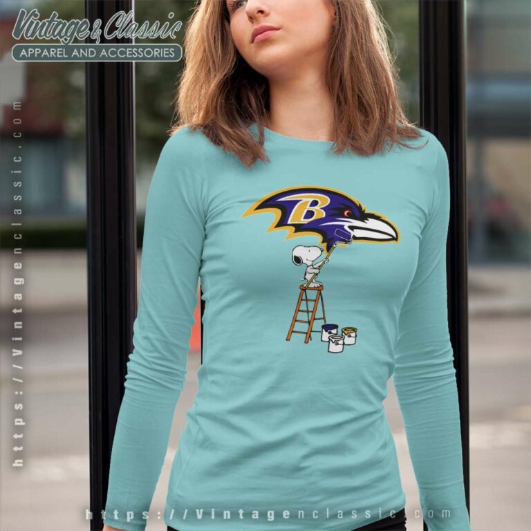 Snoopy Paints The Baltimore Ravens Logo Long Sleeve Tee Snoopy Paints The Baltimore Ravens Logo Long Sleeve Tee
