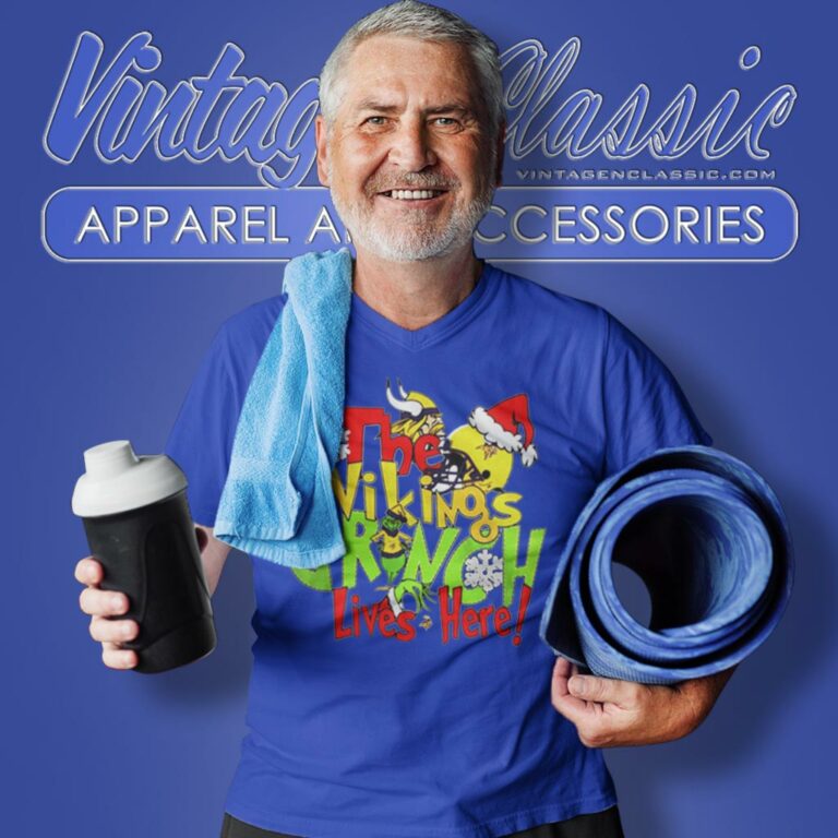 The Minnesota Vikings Grinch Lives Here Merry Christmas V Neck TShirt The Minnesota Vikings Grinch Lives Here Merry Christmas V Neck TShirt