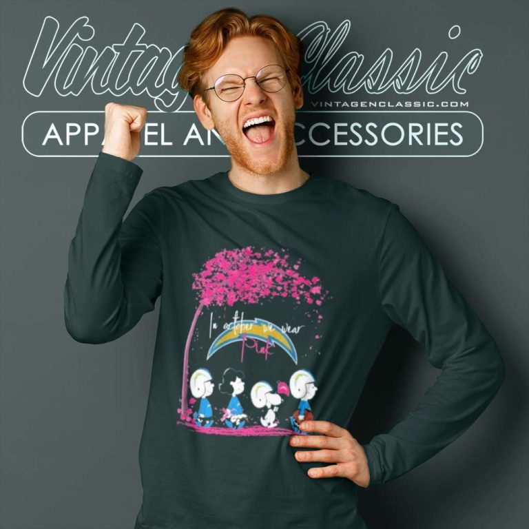 The Peanuts Characters Los Angeles Chargers In October We Wear Pink Long Sleeve Tee The Peanuts Characters Los Angeles Chargers In October We Wear Pink Long Sleeve Tee