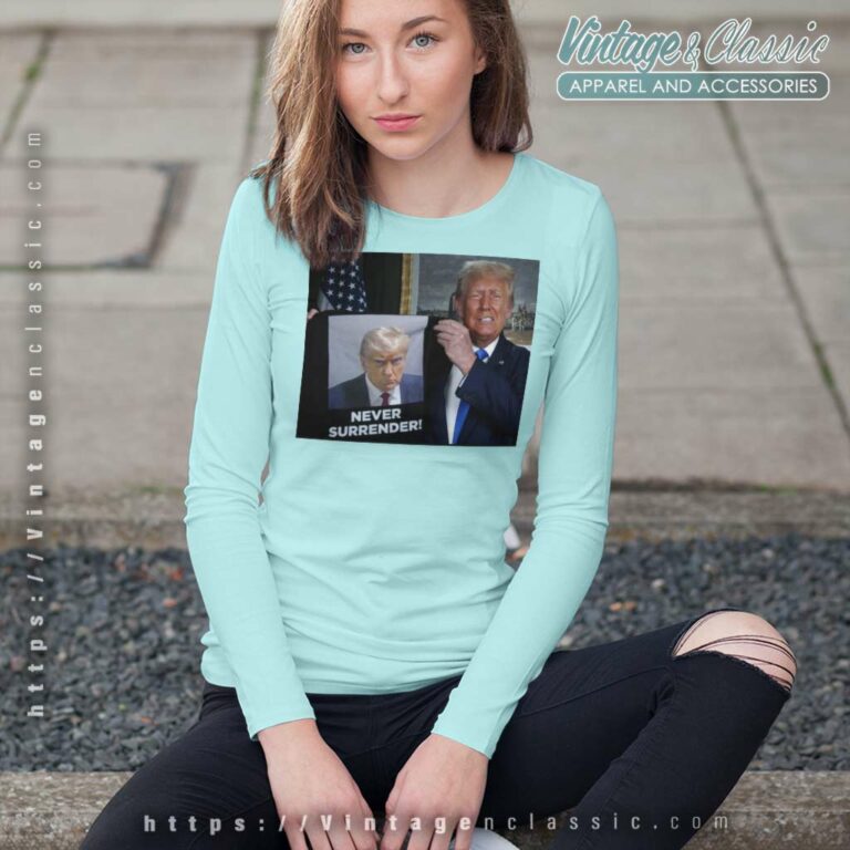 Trump Holds Up Shirt Never Surrender Long Sleeve Tee Trump Holds Up Shirt Never Surrender Long Sleeve Tee