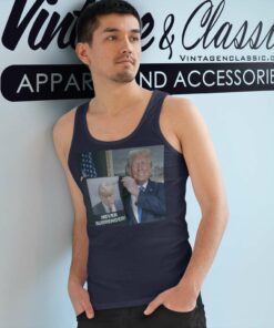 Trump Holds Up Shirt Never Surrender Tank Top Racerback