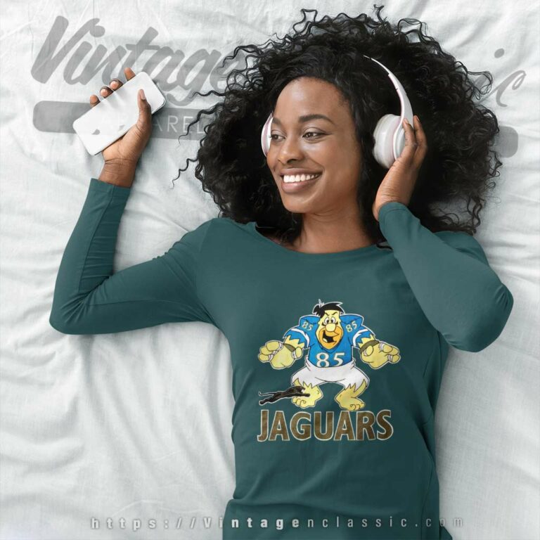 Vintage 1990s Flintstones Jacksonville Jaguars Long Sleeve Tee Vintage 1990s Flintstones Jacksonville Jaguars Long Sleeve Tee